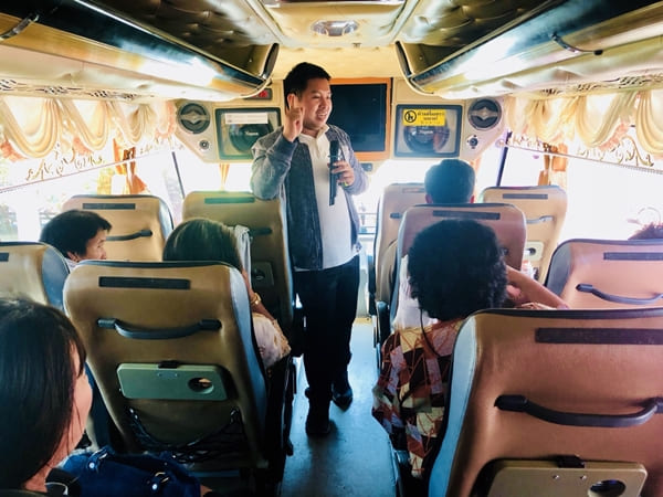 tour-guide-on-vip-bus-of-vientiane-trip