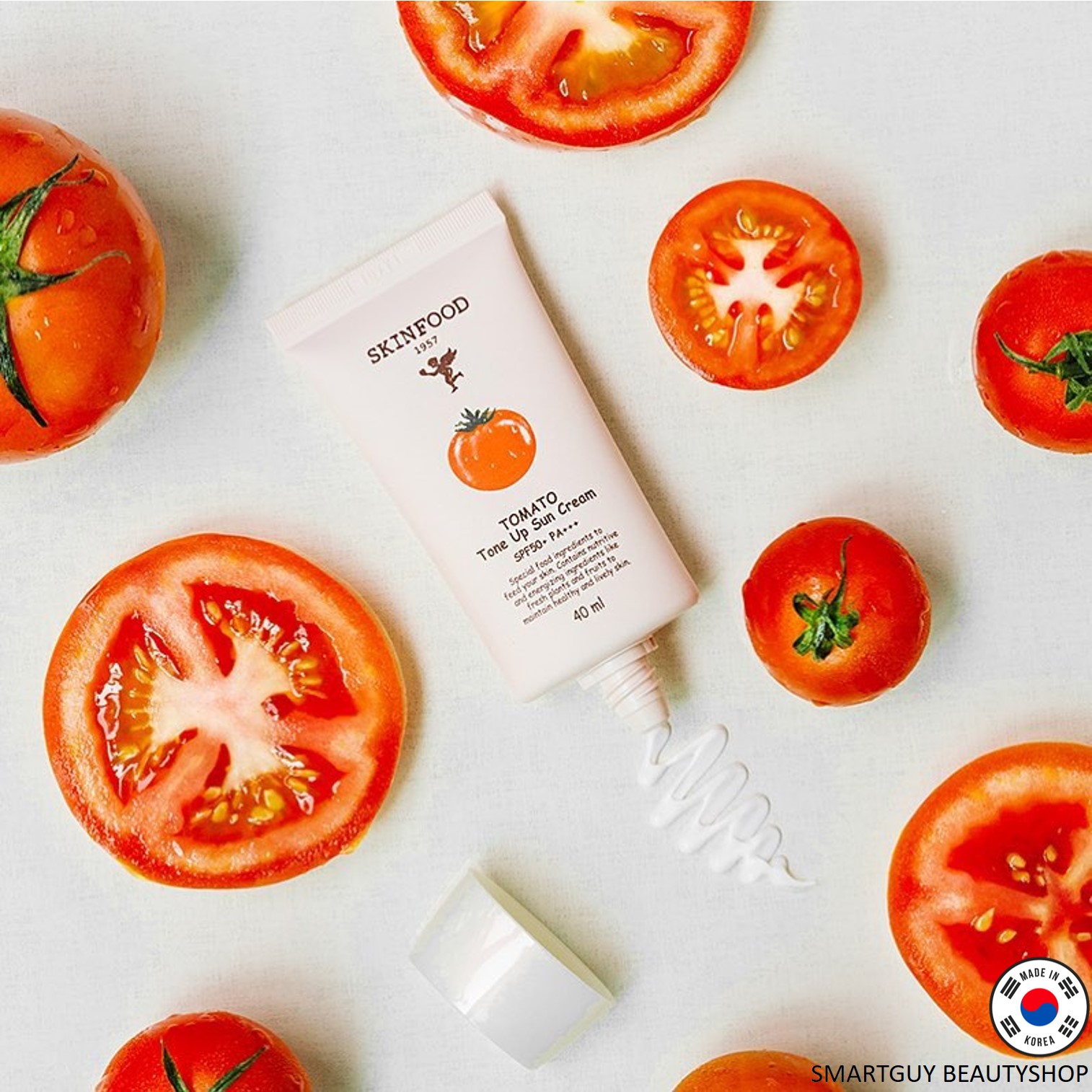 Skinfood Tomato Tone Up Sun Cream SPF50+ PA++++ 40ml. ผลิตภัณฑ์ปกป้องผิวหน้าจากแสงแดดสูตรผสมสารสกัดมะเขือเทศเพื่อผิวหน้ากระจ่างใสสินค้านำเข้าจากเกาหลีของแท้