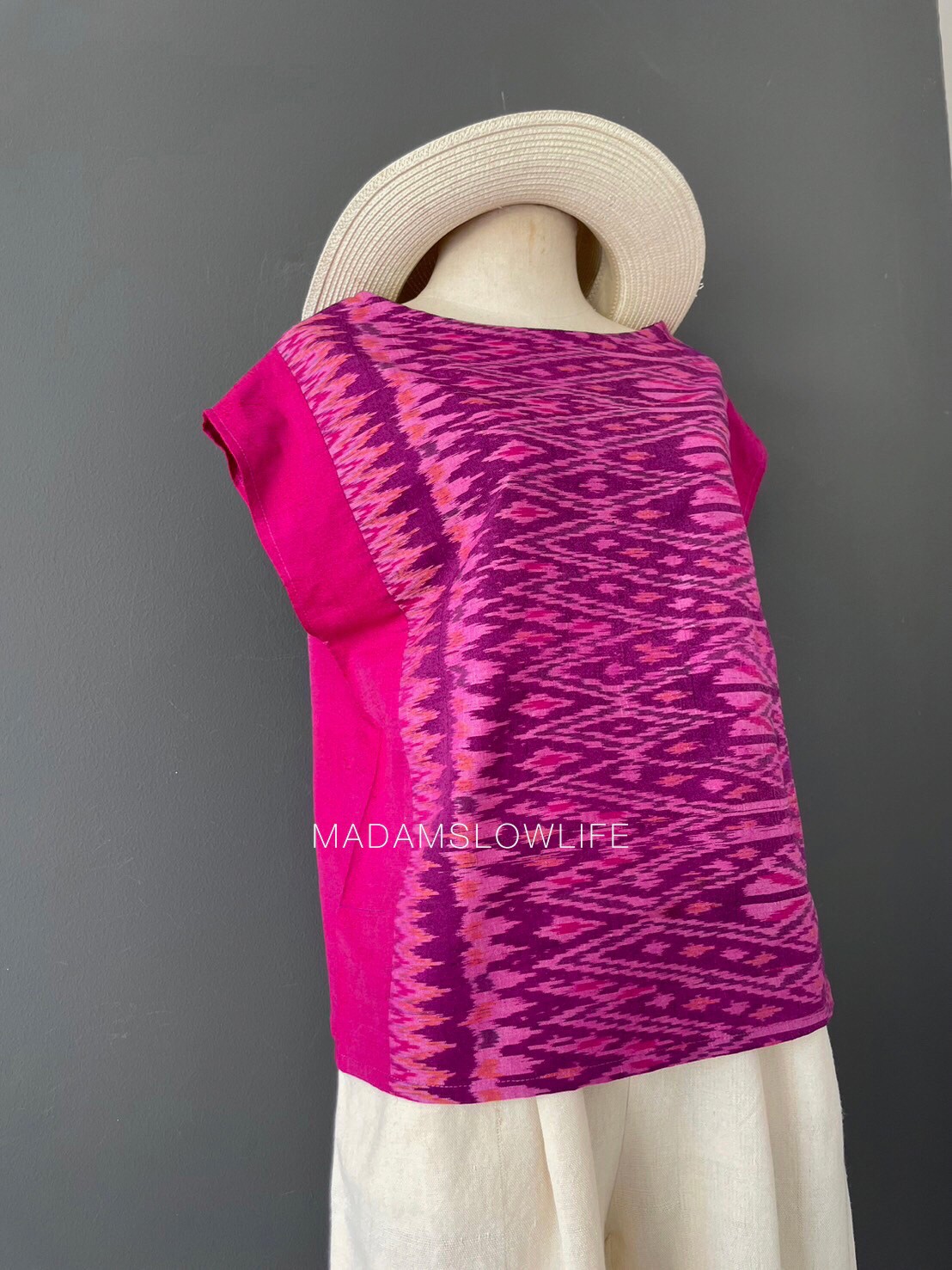 เสื้อผู้หญิง ผ้าฝ้ายมัดหมีทอมือ ลวดลายไทยโทนสีชมพูม่วง เสื้อทรงปีกผีเสื้อใส่แล้วเข้ารูปสวย