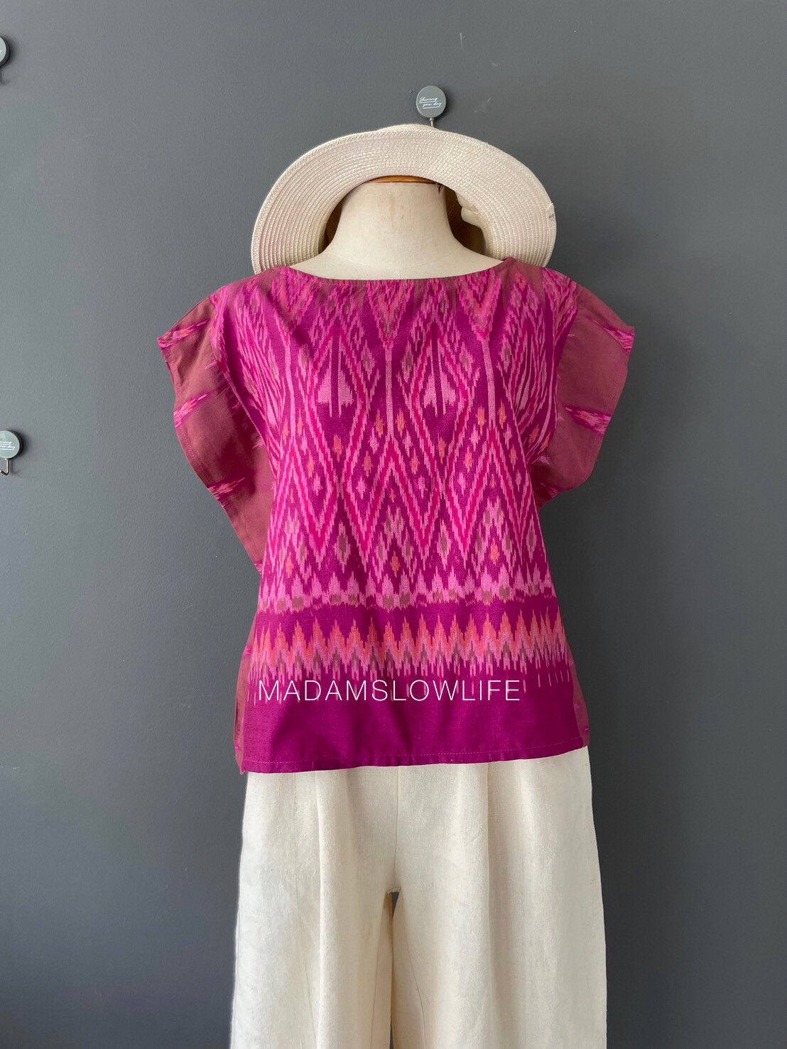 เสื้อผู้หญิง ผ้าฝ้ายมัดหมีทอมือ ลวดลายไทยโทนสีชมพูม่วง เสื้อทรงปีกผีเสื้อใส่แล้วเข้ารูปสวย